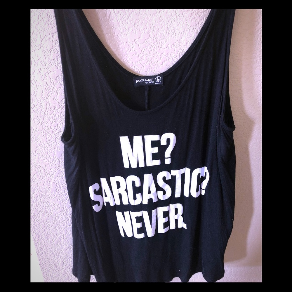 Cropped flowing cheeky tank top. Runs small